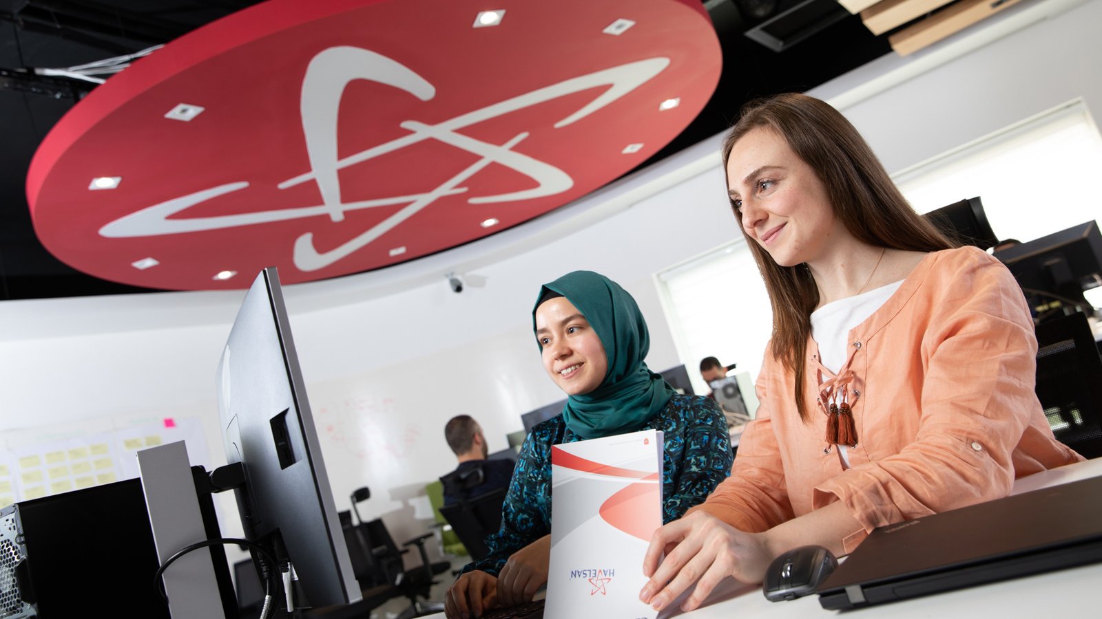 HAVELSAN employees working in a modern office environment photographed for corporate communications