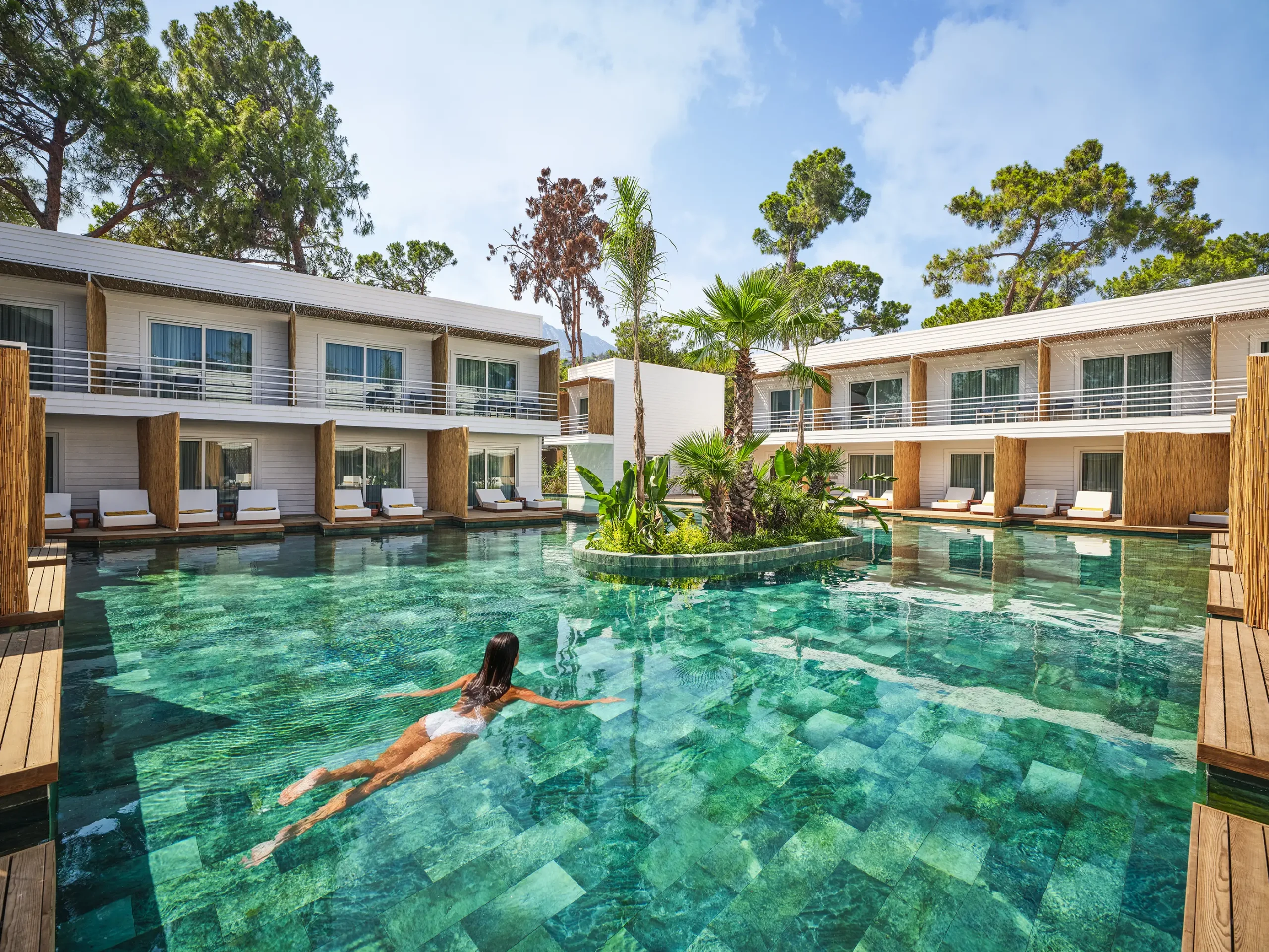 Luxury resort pool photographed for FashionTV Hotel hospitality campaign