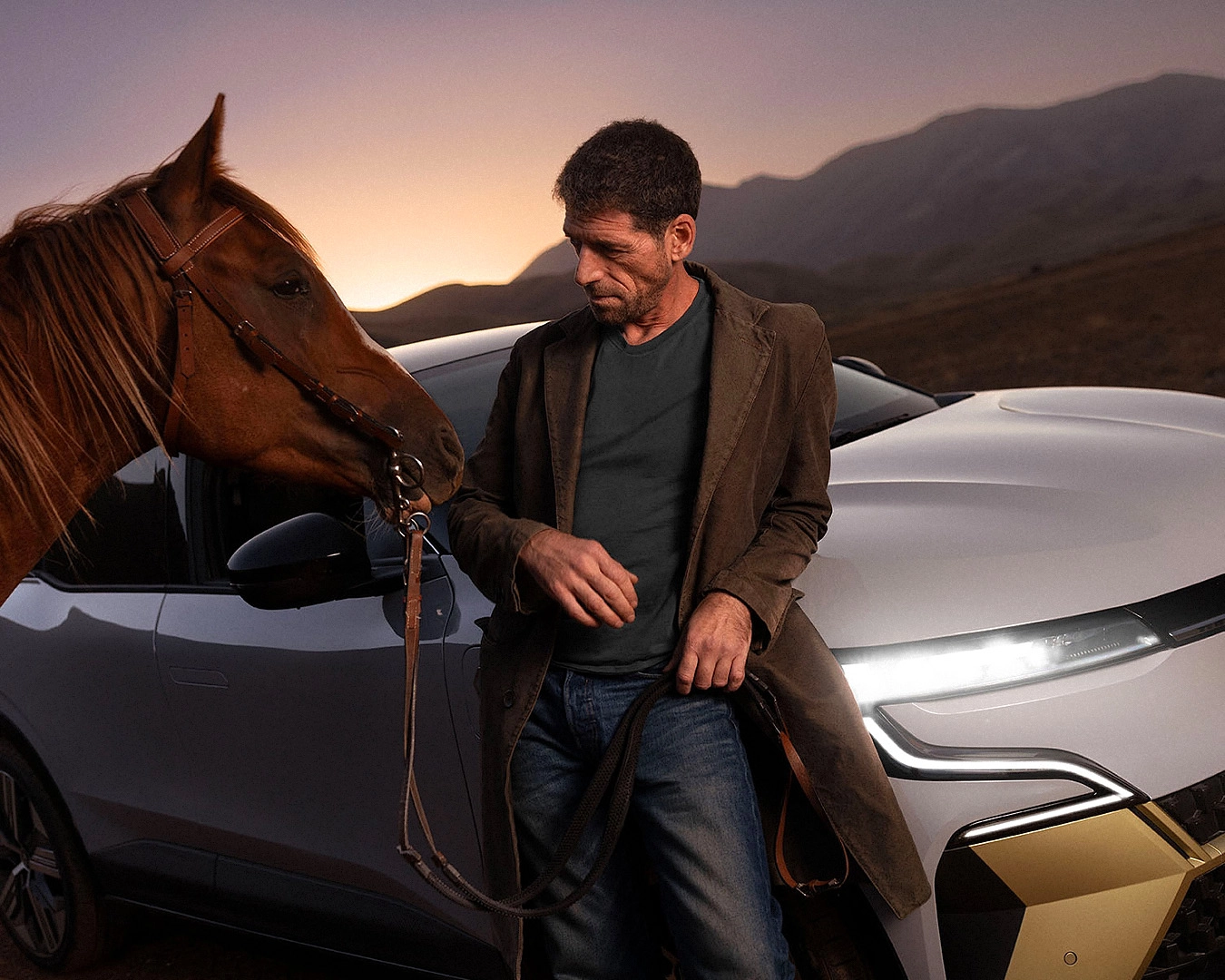 Professional automotive advertising photography featuring the Renault Megane E-Tech electric vehicle in a cinematic mountain landscape. Captured during golden hour, the image highlights innovative electric mobility, modern vehicle design, and premium automotive branding with a clean and contemporary visual style.