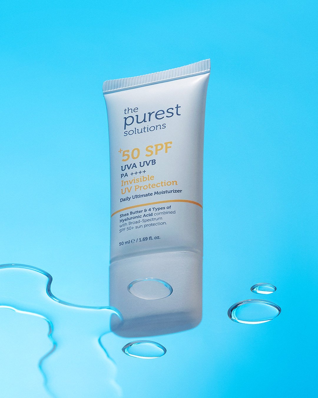 Purest skincare cream product on blue background with water reflections