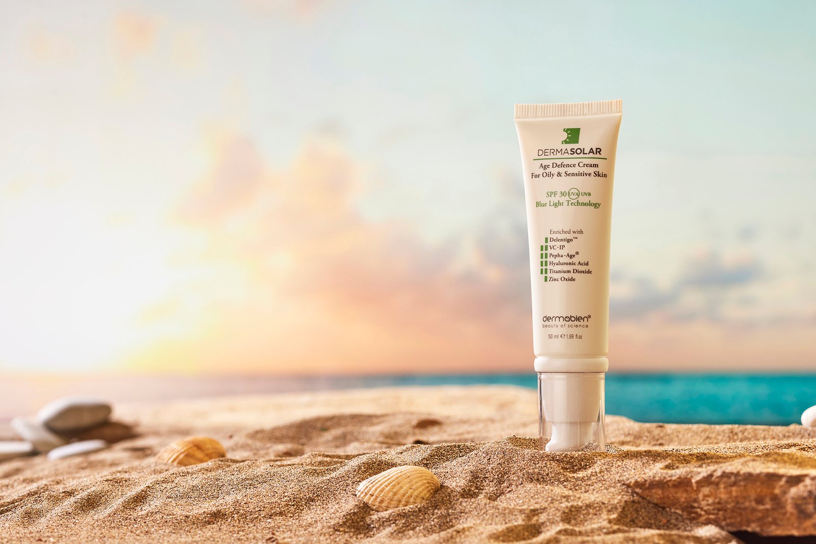 Dermabien sunscreen cream on beach with summer skincare concept