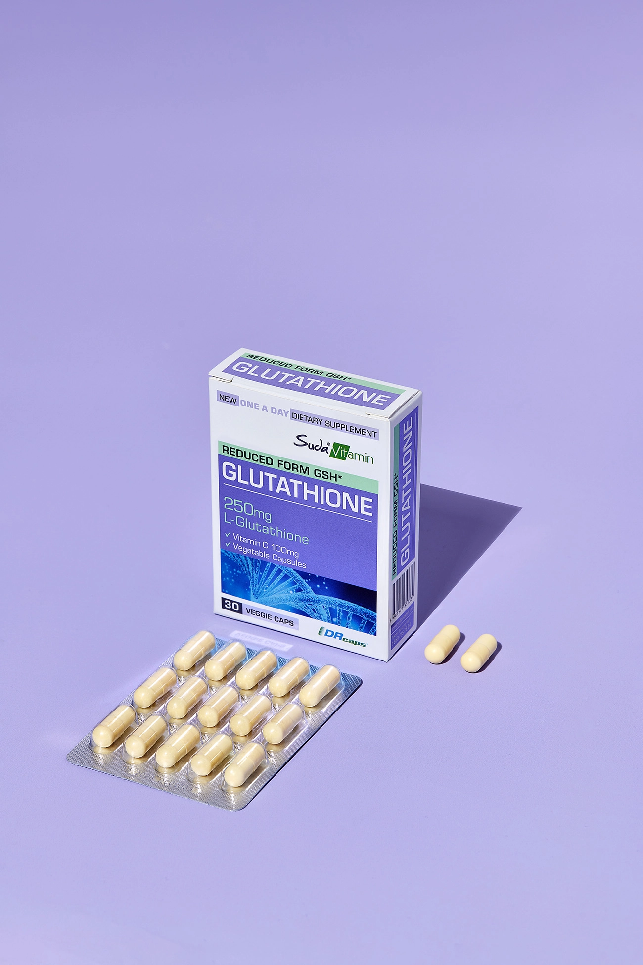 Glutathione supplement packaging and capsules displayed in a clean studio setup for healthcare product advertising.