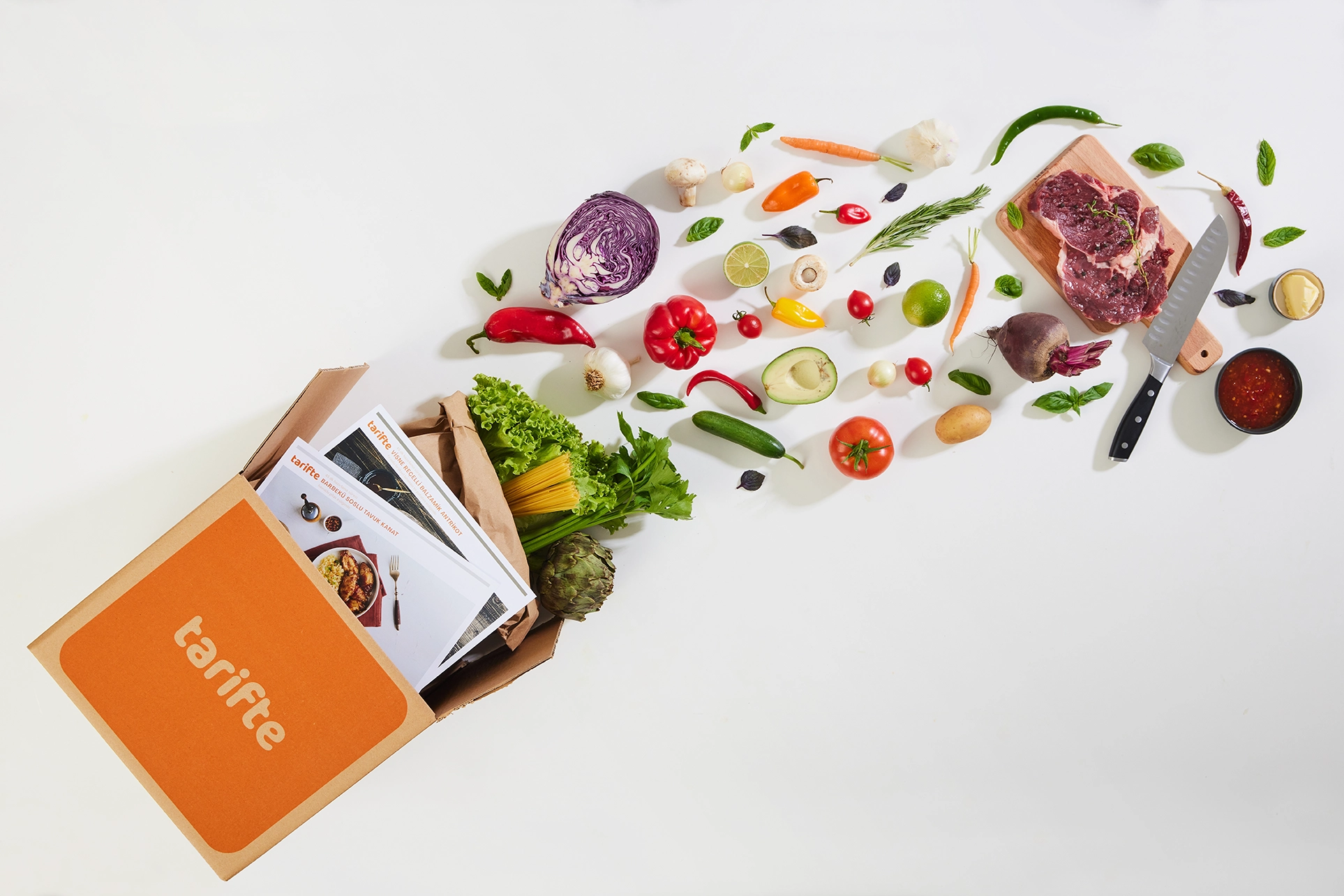 Healthy meal kit with fresh ingredients and recipe card