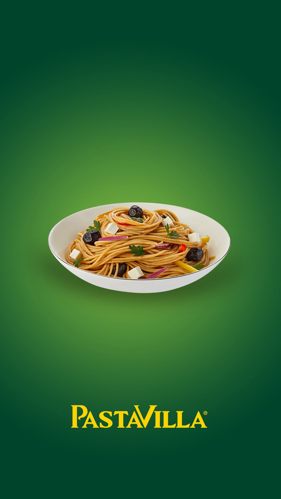 Professional commercial food photograph by Sinan Niyazi Kutsal showcasing a white bowl of gourmet whole wheat spaghetti with feta cheese and black olives on a corporate green background with the yellow Pastavilla logo.