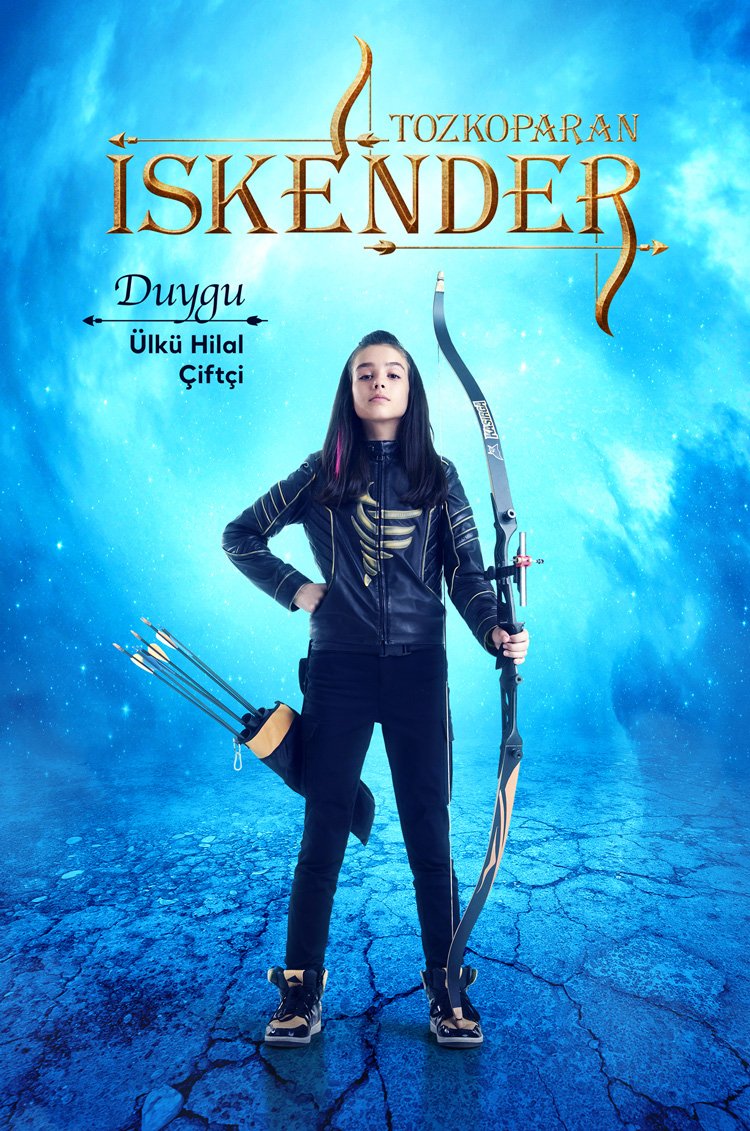 A commercial television promotional character poster by Sinan Niyazi Kutsal for TRT 1, showcasing young actress Ülkü Hilal Çiftçi in full leather archer armor standing with folded arms against a magical cosmic blue background.
