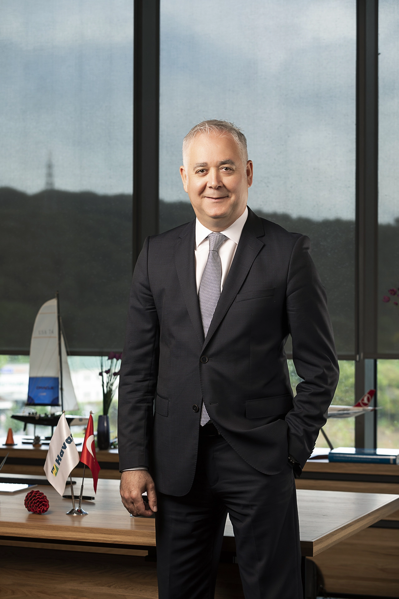 xecutive portrait of TAV Airports CEO in a modern office environment, photographed for corporate communications and leadership branding.