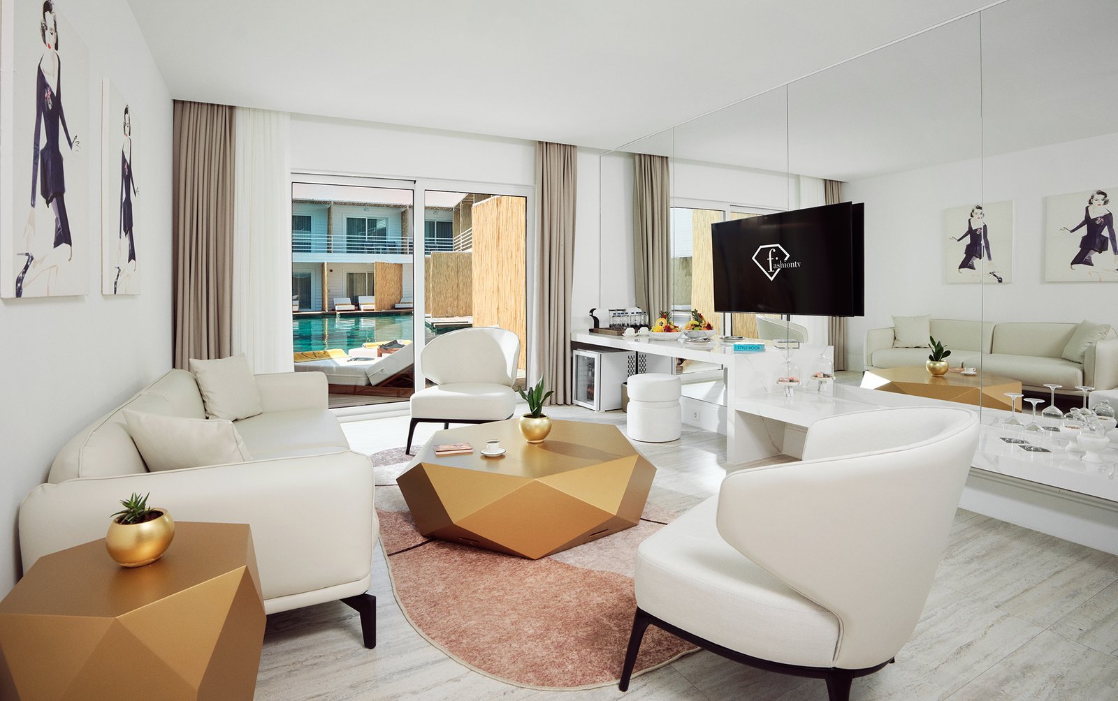 Bright luxury hotel suite interior featuring a modern living area, elegant furniture, floor-to-ceiling windows and contemporary hospitality design.