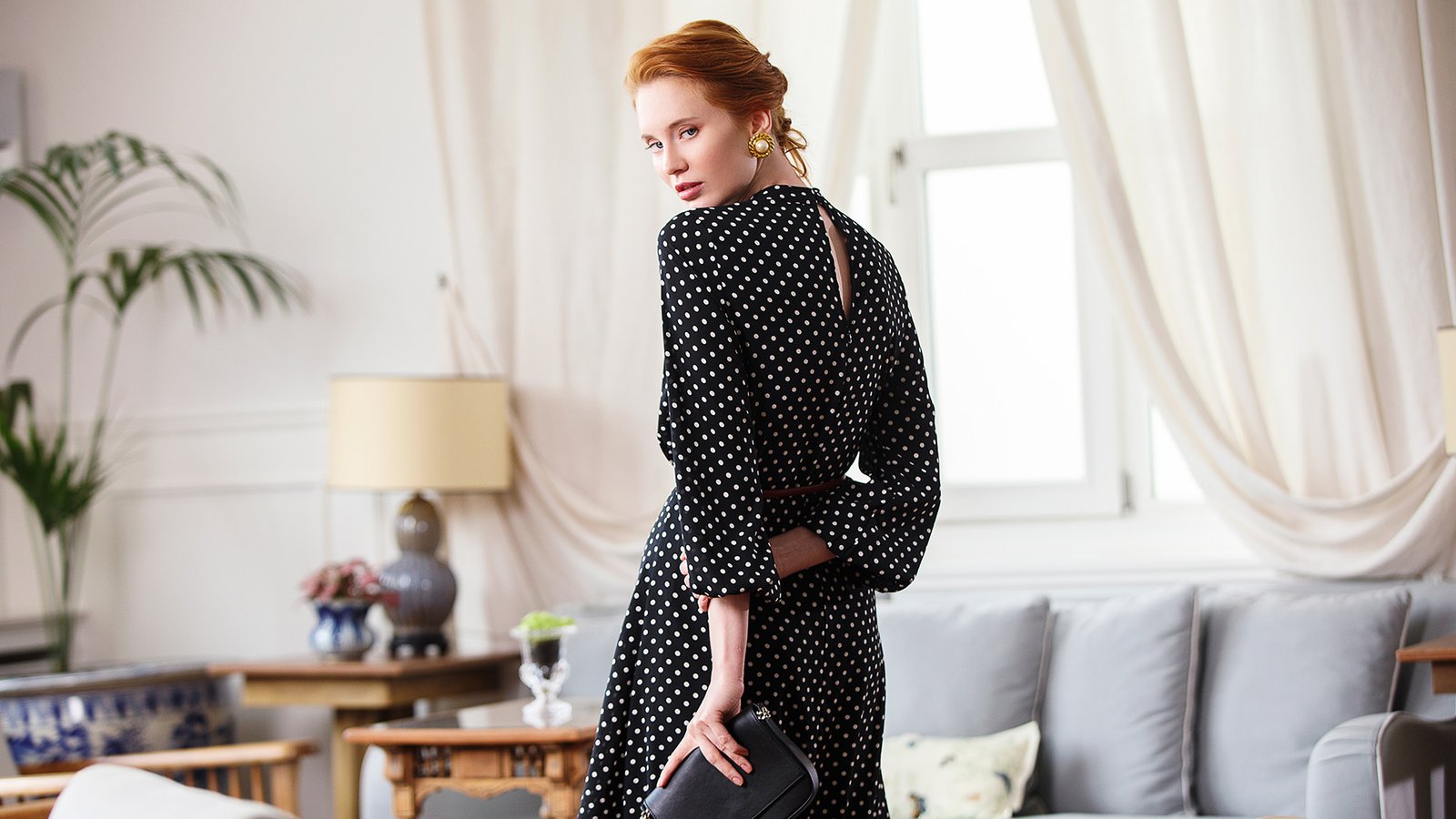 Professional commercial fashion advertising photographs by Sinan Niyazi Kutsal for Paul Mark, capturing models in upscale new season clothing inside an antique mansion parlor and walking along historical street fronts in Buyukada, Istanbul.