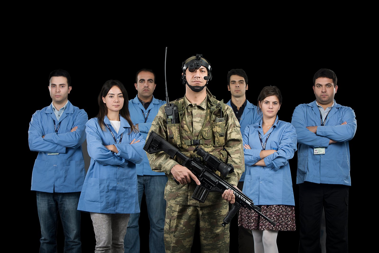 Professional commercial corporate photographs by Sinan Niyazi Kutsal for Aselsan, capturing engineers in lab coats and corporate attire working on microelectronic circuits and advanced tech machinery inside modern defense manufacturing laboratories.