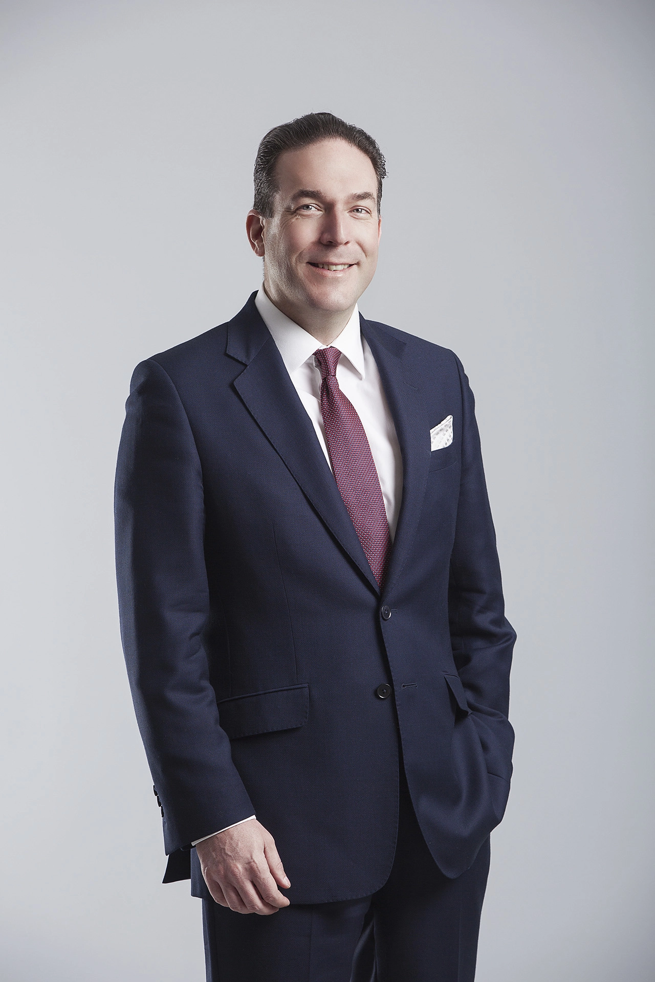 Professional executive portrait of an international business leader photographed for corporate branding and executive communications.