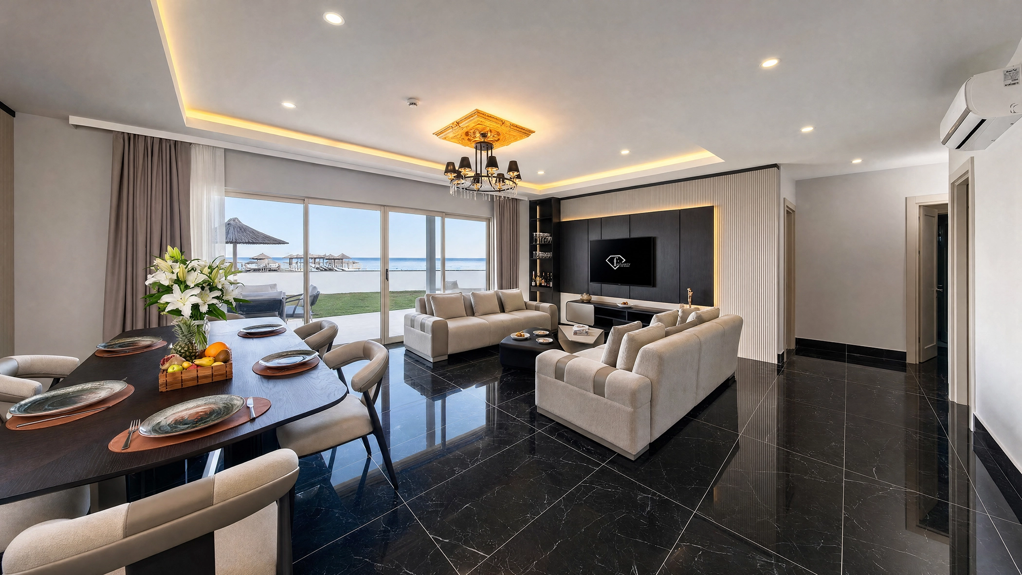 Luxury suite living room at FashionTV Hotel featuring modern furniture, elegant interior design and panoramic city views.