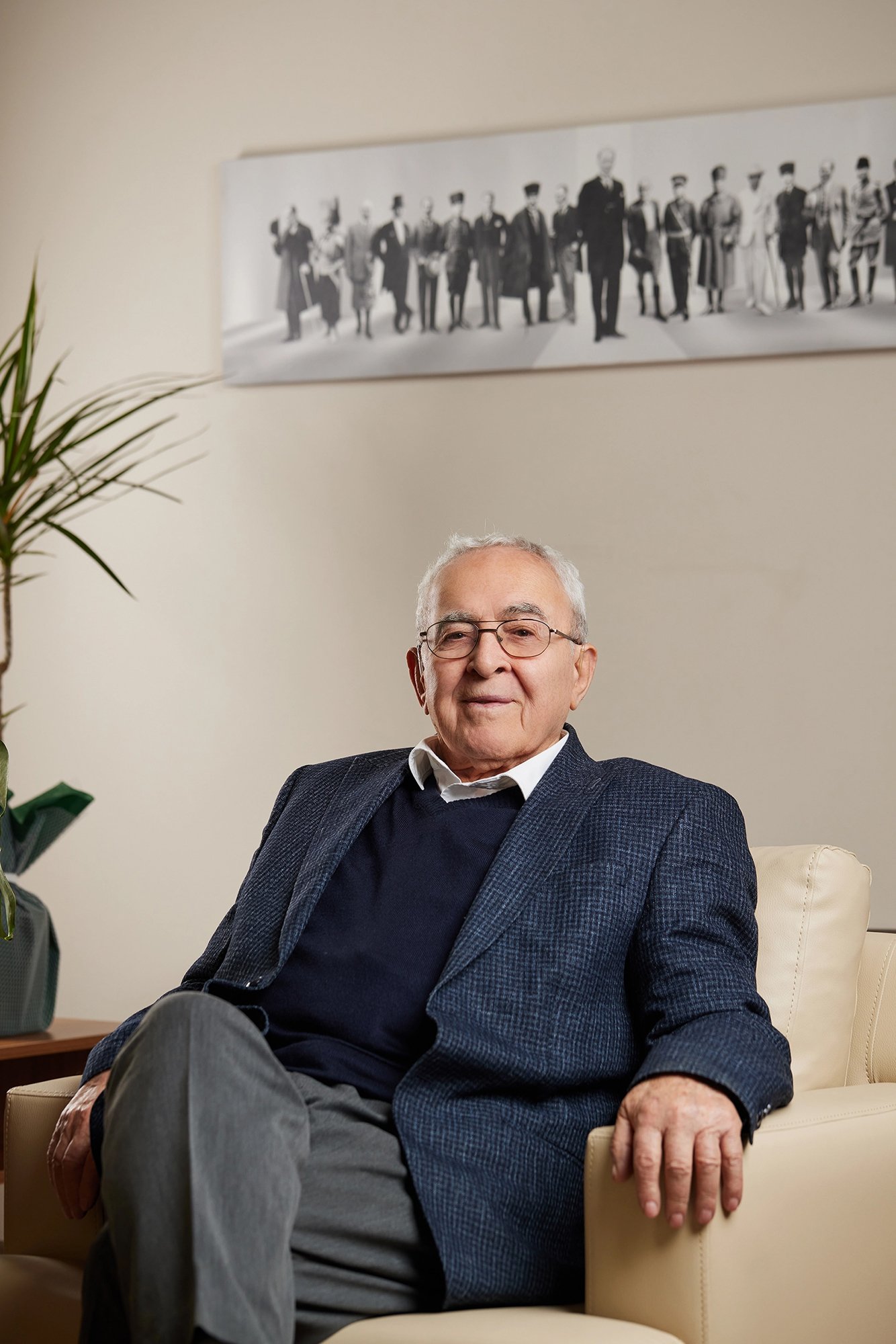 Professional executive portrait photographed in a corporate office environment.