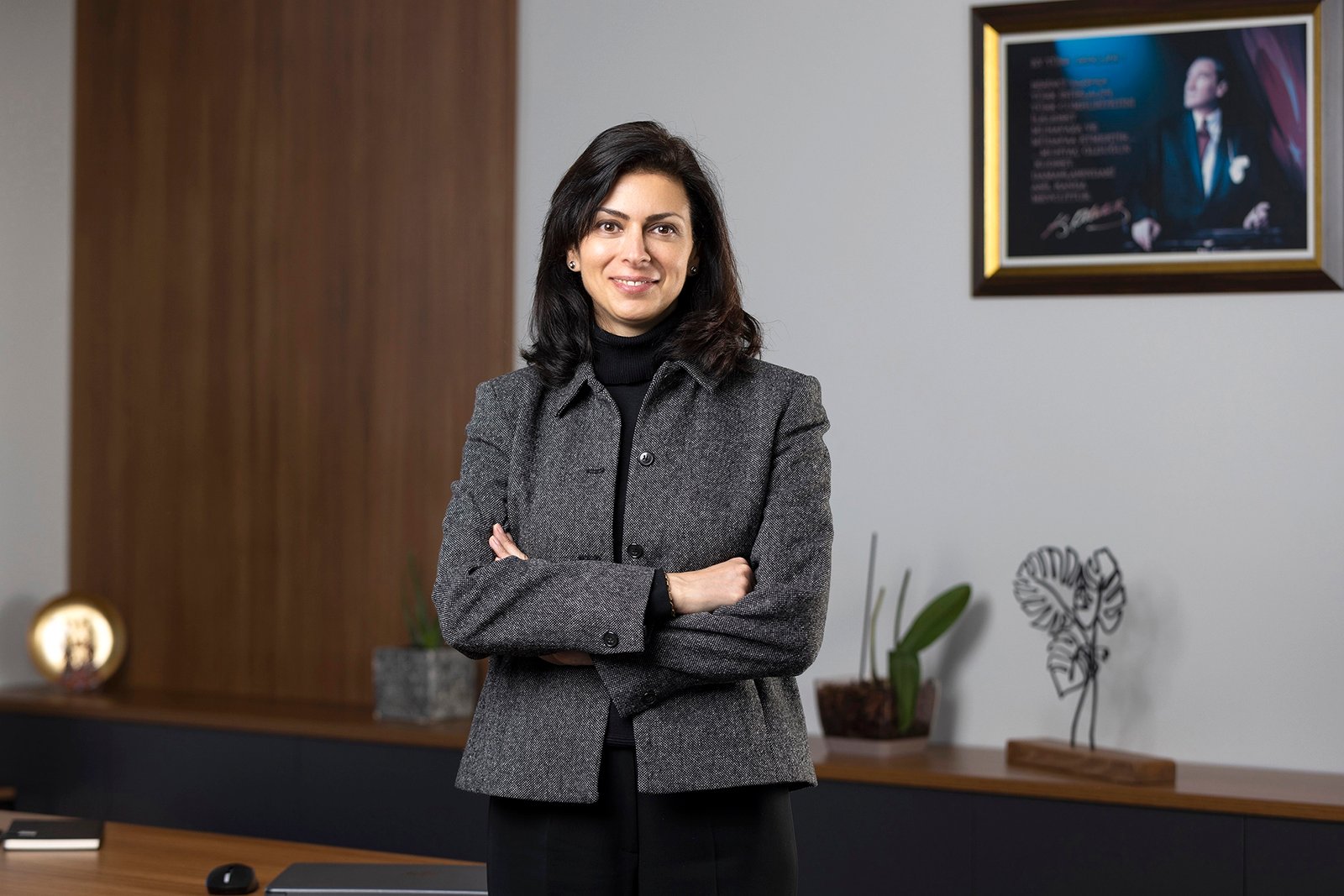 Professional executive portrait photographed in a corporate office environment.