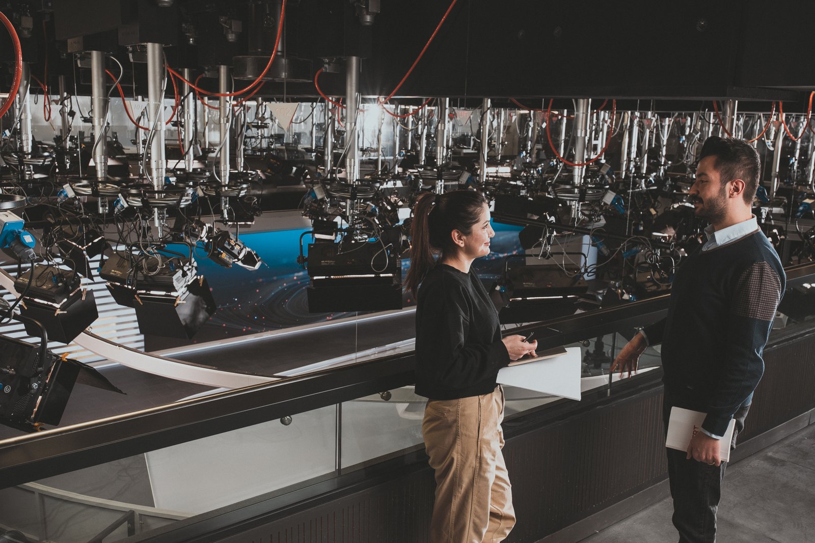 Behind the scenes of TRT Haber television broadcasting operations, featuring news studios, production teams, broadcast technology and media professionals.